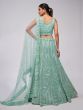 Turquoise Net Lehenga Choli In Stone Work