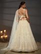 Off White Heavy Embroidered Net Lehenga Choli