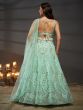 Turquoise Sequins Augmented Net Lehenga Choli