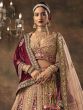 Peach And Maroon Stone Enriched Bridal Lehenga Choli