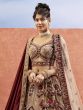 Cream Net Bridal Lehenga Choli In Heavy Stone Work