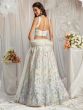 White Sequins Embroidered Lehenga Choli In Net