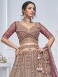 Mauve Pink Net Lehenga Choli In Zari Embellishment