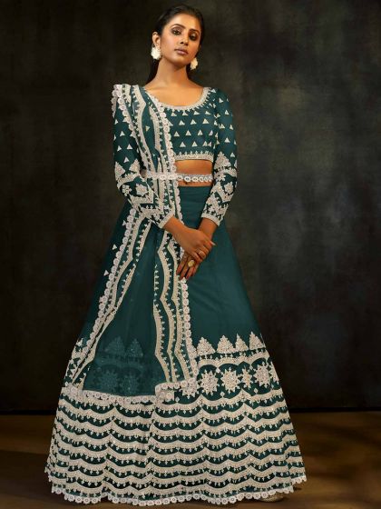 Rama Green Colour Lehenga Choli in Net Fabric.