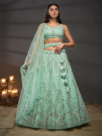 Turquoise Sequins Augmented Net Lehenga Choli