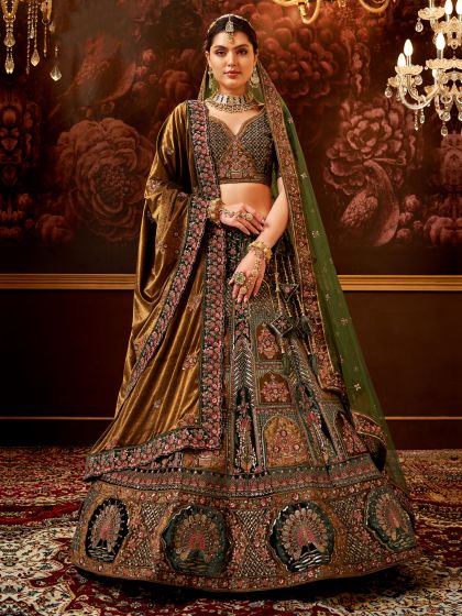 Dark Green Heavy Embroidered Lehenga Choli In Velvet