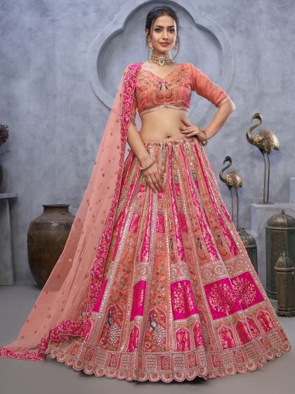 Peach And Pink Silk Lehenga Choli In Zari Weaving