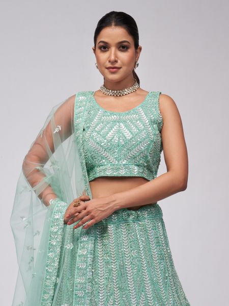 Turquoise Net Lehenga Choli In Stone Work